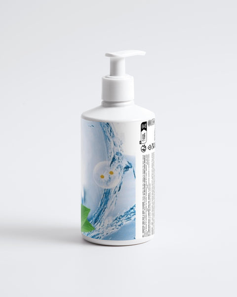White bottle with a colorful label on a white background