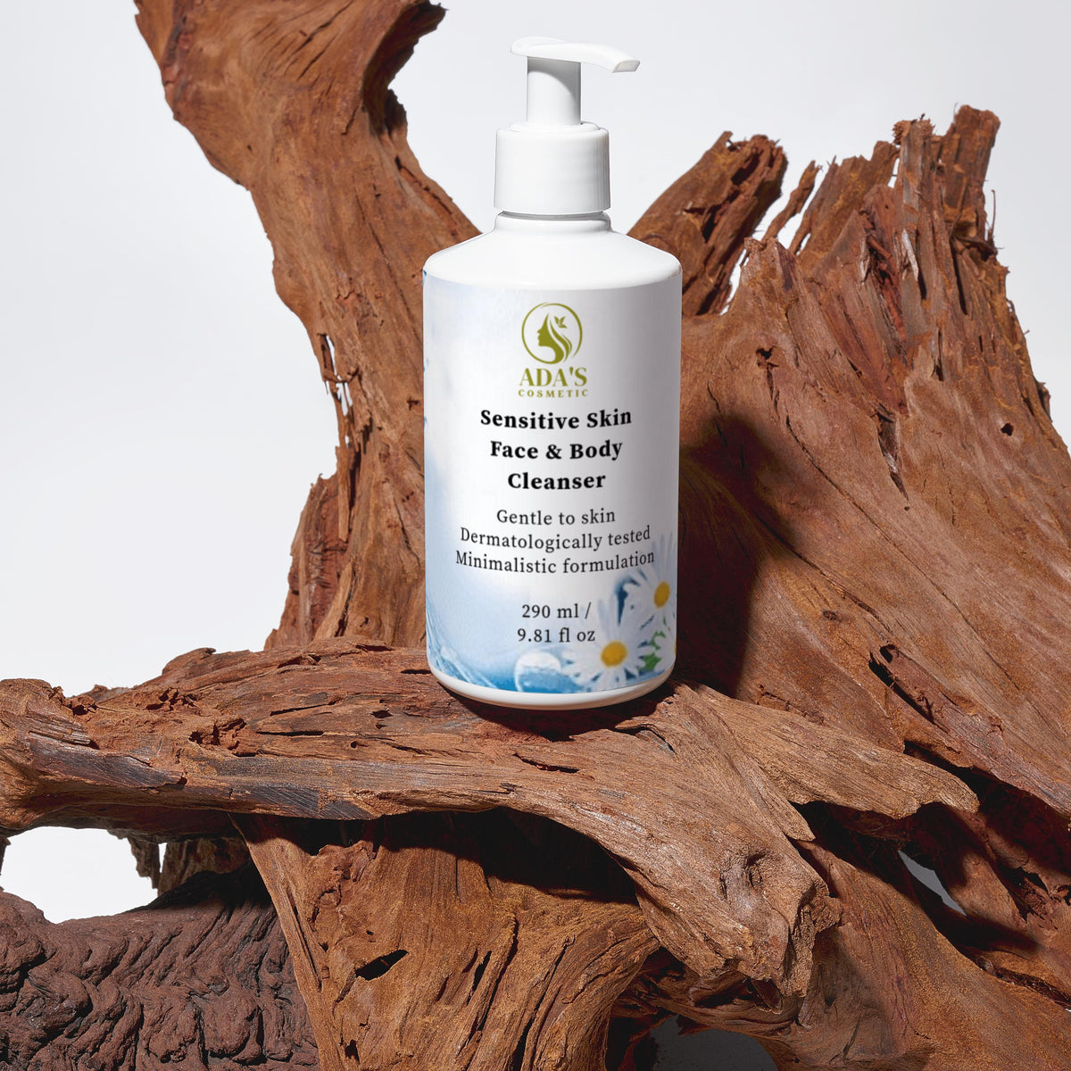 Bottle of ADAN'S Sensitive Skin Face & Body Cleanser on a wooden surface