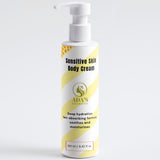 Sensitive skin body cream bottle with yellow label on a white background