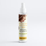 Hair mist bottle with a label on a white background